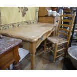 A vintage pine Console Table, the scalloped top upon two frieze drawers, raised on tapering legs and