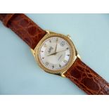 A gold-plated DuBois Automatic gentleman's Wristwatch, with Swiss movement, the silvered dial with