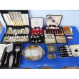 A quantity of Silver Plate, mostly flatware, including some cased sets of spoons, a Walker & Hall