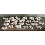 A large quantity of Crested China Pigs, all painted with different crests and place names,