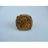 An Edward VII gold Sovereign, dated 1905, set in a large 9ct gold gentleman's ring mount, total