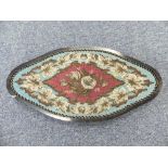 A Victorian beadwork Footstool, the blue ground with floral decoration, enclosing central pink