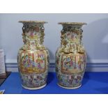 A pair of 19th century Chinese famille rose porcelain Vases, each with panel decoration of figures