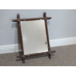 A 19th century continental oak wall Mirror, the frame with chamfered details and inlaid with star