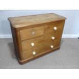 A Victorian pine Chest of Drawers, two short over three long drawers, one ceramic knob missing, 41½