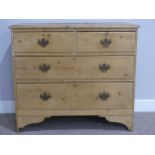 A reclaimed pine Chest of Drawers, two short over two long, raised on bracket feet with brass