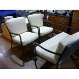 A modern 'Emu' metal furniture three-piece Suite, with loose white upholstered seats and backs,