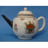 An 18thC Chinese Export Armorial Teapot, decorated in floral sprays with central crest and gilded