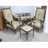An associated four piece suite of Edwardian furniture, of similar style and upholstered in