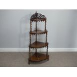 A Victorian rosewood four-tier bow-front Whatnot, with pierced fretwork and spiral turned