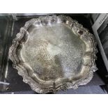 An Edwardian silver-plated Platter, the gadrooned edge with foliate decoration, enclosing the