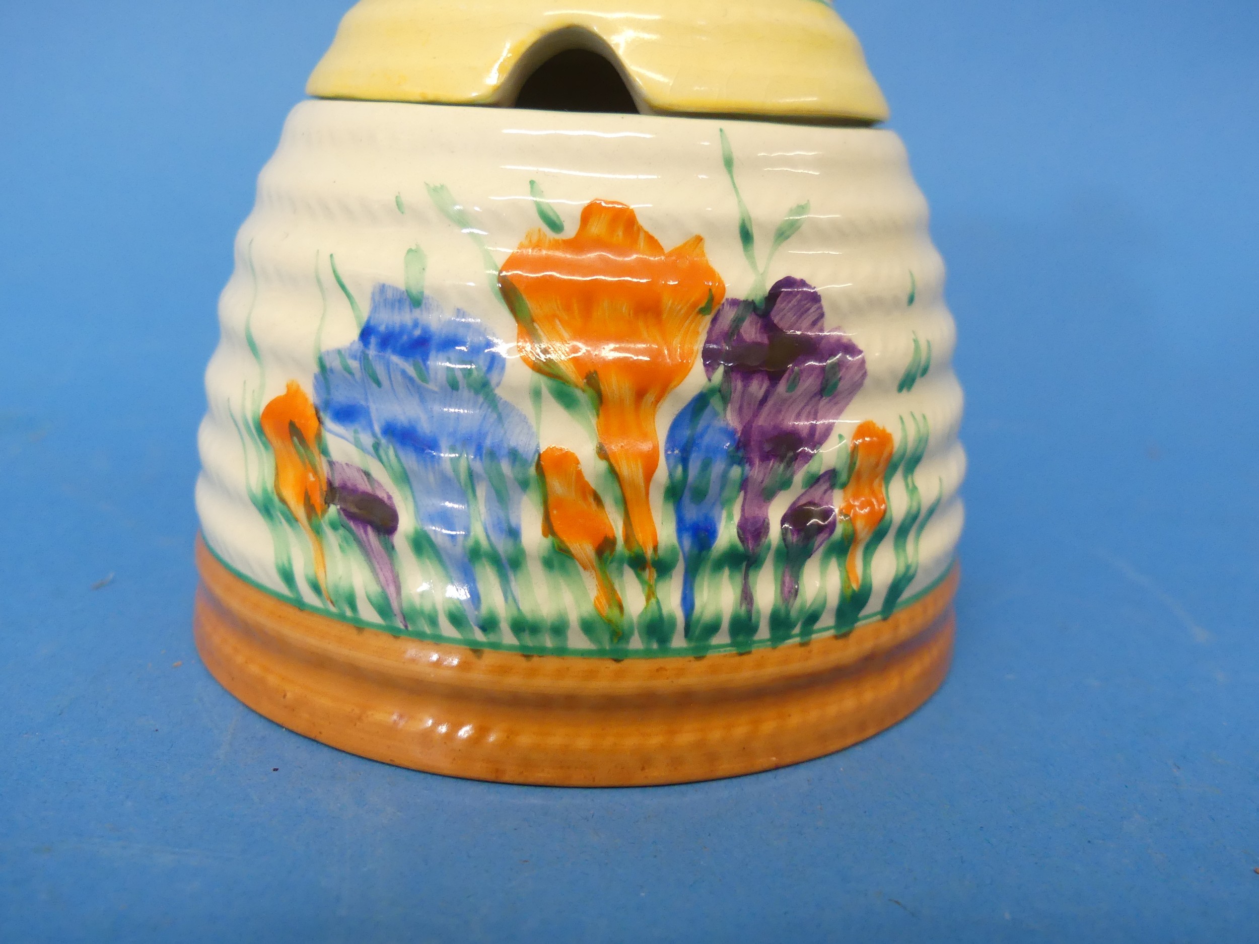 An early 20thC Clarice Cliff Newport Pottery 'Spring Crocus' pattern Honey Pot, with bee finial, - Image 5 of 10