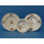 An 18thC Chelsea porcelain Plate, circa 1755, with moulded decorations and floral sprays,