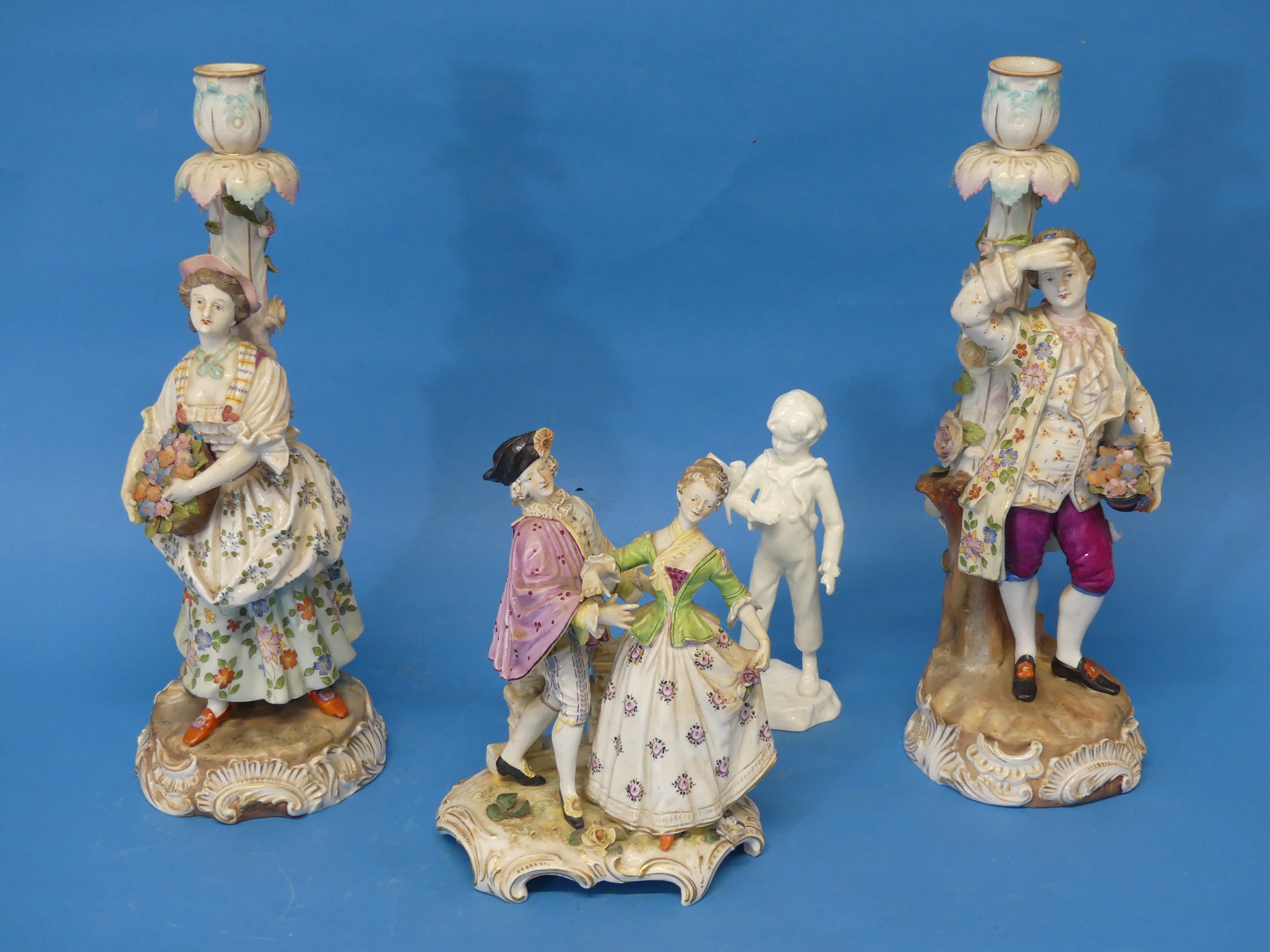 A pair of 19thC Volkstedt-Rudolstadt porcelain Figural Candlesticks, with blue painted mark to base,