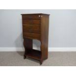 An Edwardian walnut sheet Music Cabinet, fitted with five drawers and an open shelf, 19½in (49.