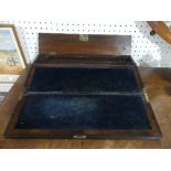 A Victorian Rosewood and Mother of Pearl inlaid Writing Slope, the hinged lid revealing touled leat