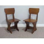 A pair of mid 20thC teak Chapel Chairs, of modern ecclesiastical design, 15¼in wide x 17½in deep x