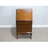 An Edwardian mahogany and inlaid Bureau, the hinged fall front enclosing a fitted interior above