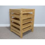 Contemporary design: a pine slatted set of stacking drawers in the form of a traditional apple