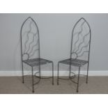 Contemporary design: a pair of craftsman-made wrought iron Chairs, of sun-ray design, 47½in (