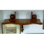 A Victorian mahogany wall Bracket, of shaped rectangular form with central scrolled support, 27in (