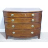 A Georgian mahogany bow-front chest of drawers, the shaped rectangular top with moulded edge above