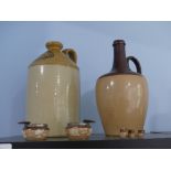 A stoneware Flagon for Harrods Stores Ltd, together with a Doulton stoneware Flagon, and two