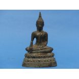An antique bronze Buddhist Temple Figure, of the seated Buddha, possibly a 'Grand Tour' souvenir,