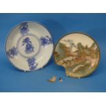 An interesting Oriental blue and White Charger, decorated with mythical creatures, together with a