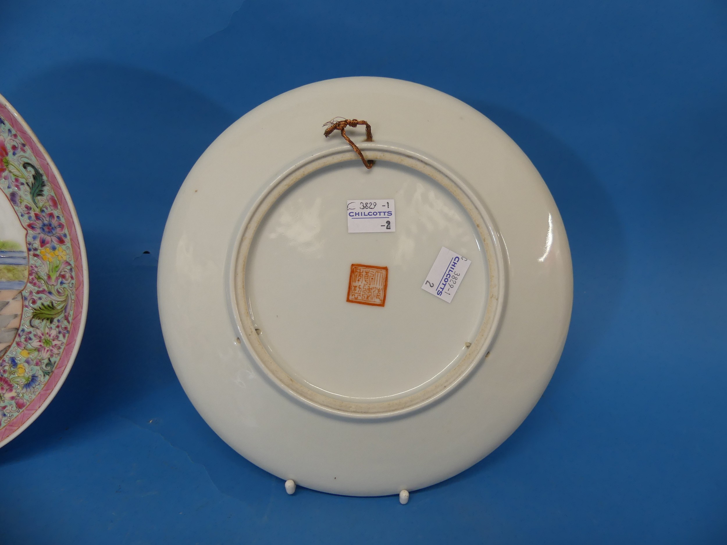 A pair of early 20thC Chinese porcelain Wall Plates, one chipped, red character mark to base, - Image 5 of 8