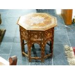 An early 20th century Indian octagonal teak occasional Table, the top inlaid with bone and ivory