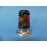 A Moorcroft and Tudric pewter mounted 'Pomegranate' pattern Cruet, the tube-lined design, with