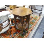 A small oak Arts and Crafts Occasional Table, of hexagonal form, raised on turned legs, 18½in (48cm