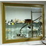 A large modern wall Mirror, framed with bevelled edge glass, 36in x 46in (91.5cm x 117cm)
