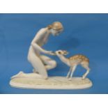 A Hutschenreuther 'Gute Freunde' porcelain Figure, depicting a woman close to a deer, by Carl
