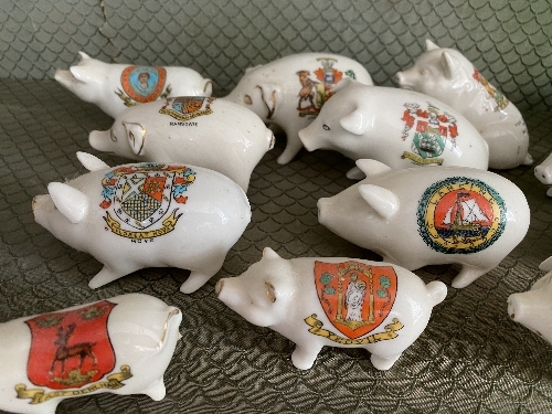 A large quantity of Crested China Pigs, all painted with different crests and place names, with - Image 3 of 8