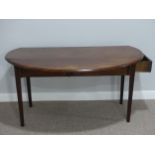 A 19thC mahogany oval Pembroke Table, raised on square tapering legs, 53in (134cm) long x 41in (