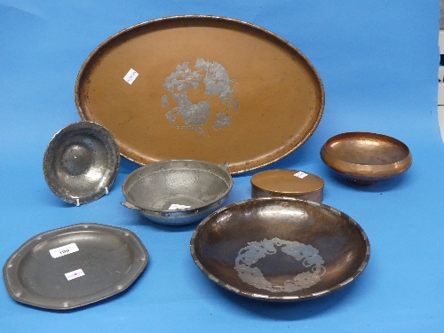 A quantity of Arts and Crafts metalwares; comprising a Hugh Wallis hammered copper bowl with