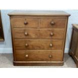 A Victorian mahogany Chest of Drawers, two short and three long, raised on bun feet, 41in wide x