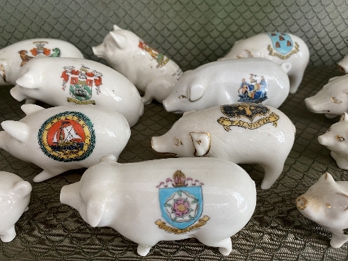 A large quantity of Crested China Pigs, all painted with different crests and place names, with - Image 5 of 8