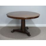 A Victorian mahogany circular tilt-top Table, with tripod base and paw feet, octagonal stem, 47½