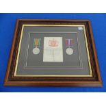 A W.W.1 pair of Medals, framed, and a W.W.2 pair of Medals, framed, together with a small collection