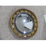 A 19thC Regency-style convex Mirror, the convexed plate within gilt wooden frame with ball