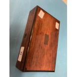 An early 20thC mahogany cased set of Draughtsman Implements, containing a compasses etc.