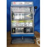 A Jubilee International Tic-Tac-Toe Slot Machine, one arm bandit, 6d play, blue, in working order,