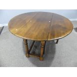 A Multiyork 19thC Style oak Gate-leg Table, the oval top raised on turned legs, 64in (162cm) long