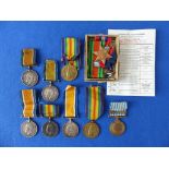 A quantity of Medals and Militaria, including five W.W.1 British War Medals, two Victory Medals,