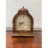 An early 20thC mahogany cased Mantel Clock, painted in the Chinoiserie style, with a small central