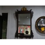 An antique oak rectangular Wall Mirror, with moulded frame surmounted with a giltwood eagle, 19in (