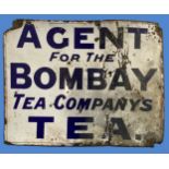 An early 20thC "Agent for the Bombay Tea Company's Tea" enamel advertising sign, blue lettering on a
